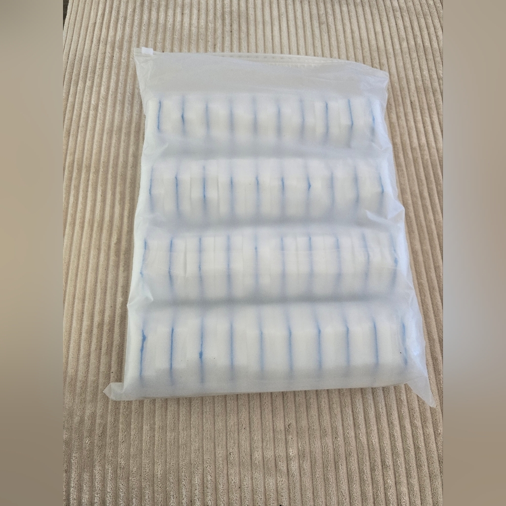 White and Blue Compressed Towels